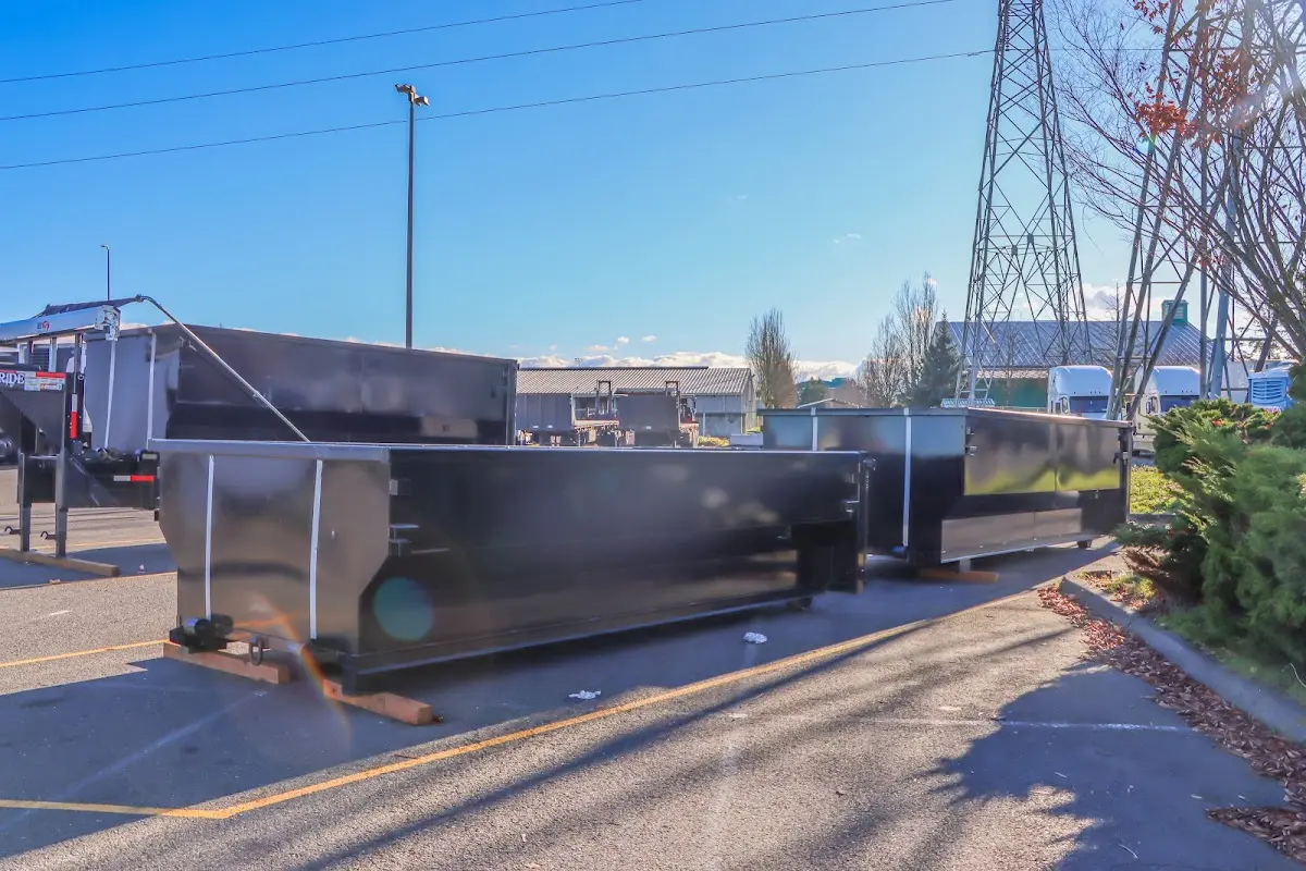 Roll-off dumpster ready for waste disposal at job site for Construction Dumpster Rental in Cherry Creek